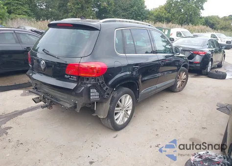 2014 Volkswagen Tiguan Sel z USA, uszkodzony, nr VIN WVGBV3AX0EW601416